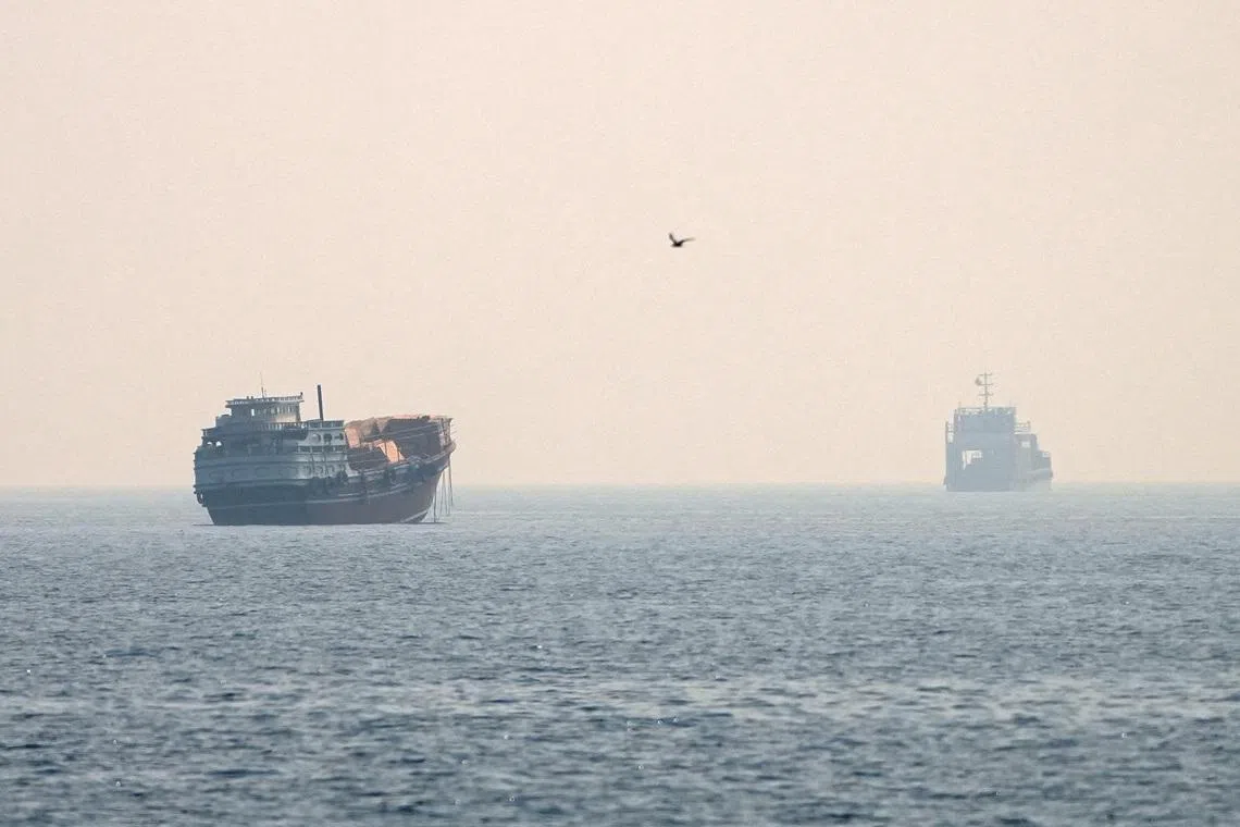 Vessels at the Strait of Hormuz, as seen from Musandam, Oman, on July 8.