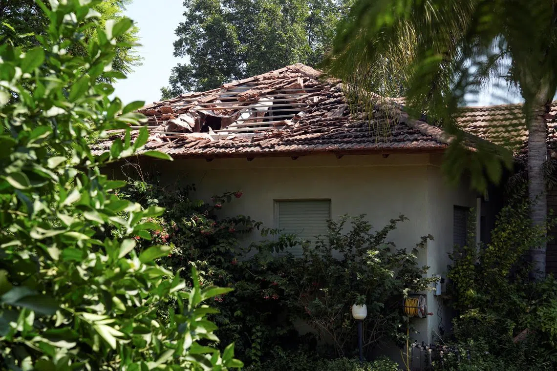 FILE PHOTO: A view shows damage to a residential building, after Hezbollah launched hundreds of rockets and drones towards Israel in what the Iranian-backed movement said was a response to the assassination of a senior commander in Beirut last month, in northern Israel August 25, 2024. REUTERS/Ayal Margolin/File Photo
