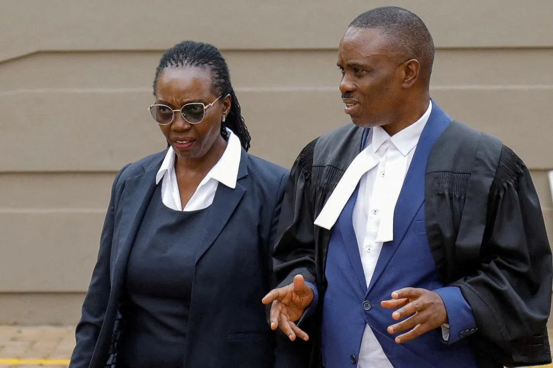 Uganda court charges lawyer for jailed Ugandan opposition leader with concealing treason