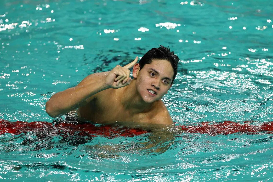National swimmer Joseph Schooling celebrating his win in the men's 200m butterfly at the 2011 SEA Games.