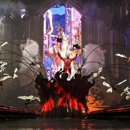 Artists dance during the first indoor showcase of electronic music festival 'The Magic of Tomorrowland' at the Hero Dome in Shanghai on Nov 22.
