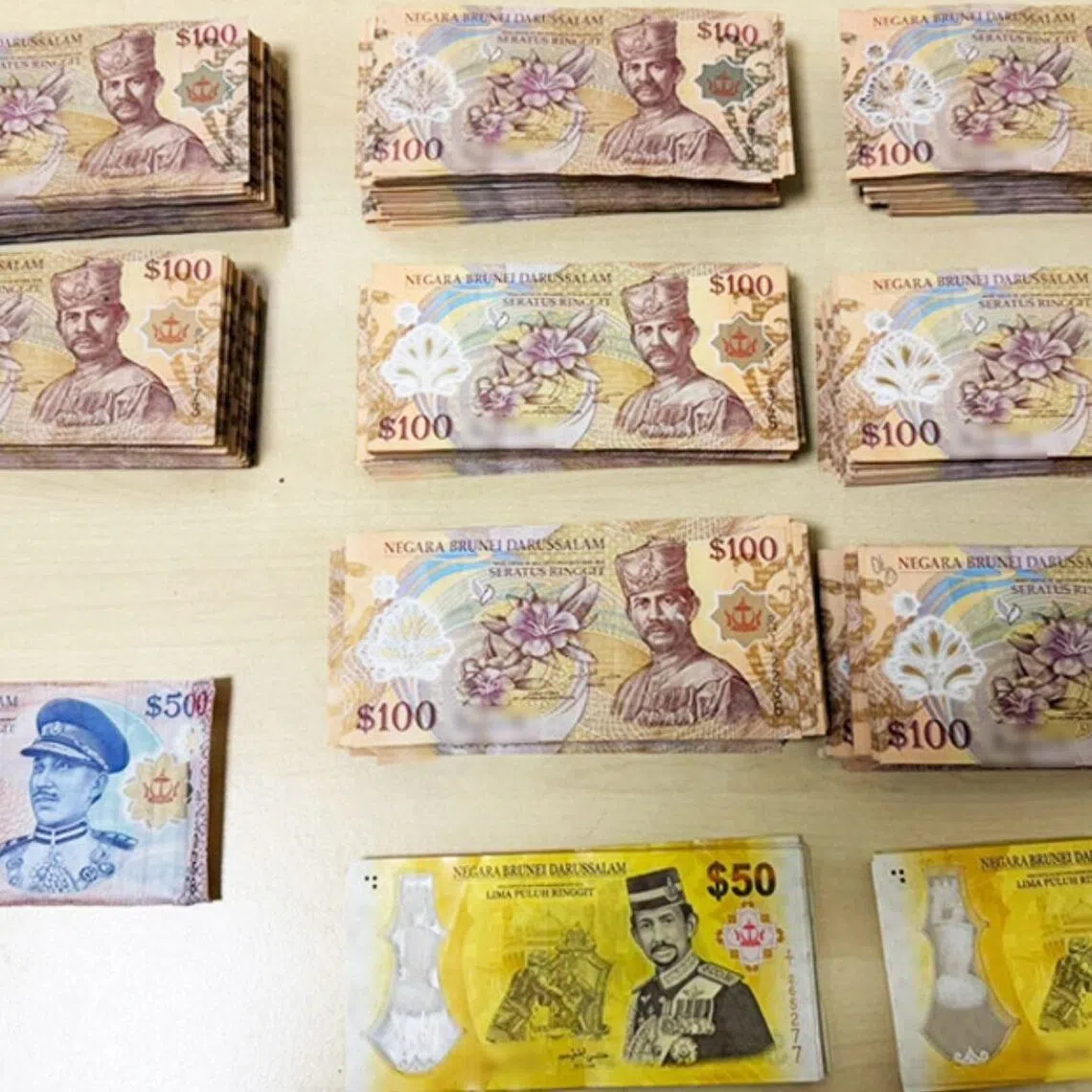 ICA officers discovered currencies concealed under the passenger seat, inside luggage and within a backpack.