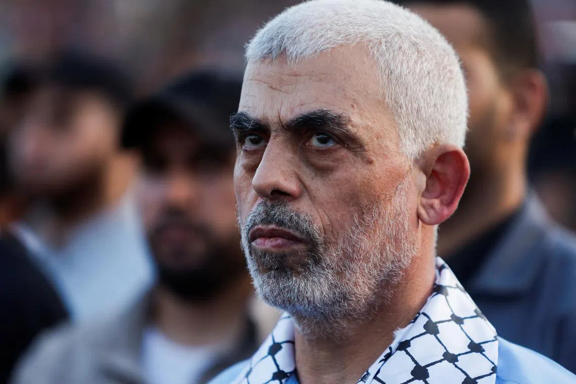 FILE PHOTO: Hamas leader Yehya Al-Sinwar looks on as palestinians Hamas supporters take part in an anti-Israel rally over tension in Jerusalem's Al-Aqsa mosque, in Gaza City October 1, 2022. REUTERS/Mohammed Salem/File Photo
