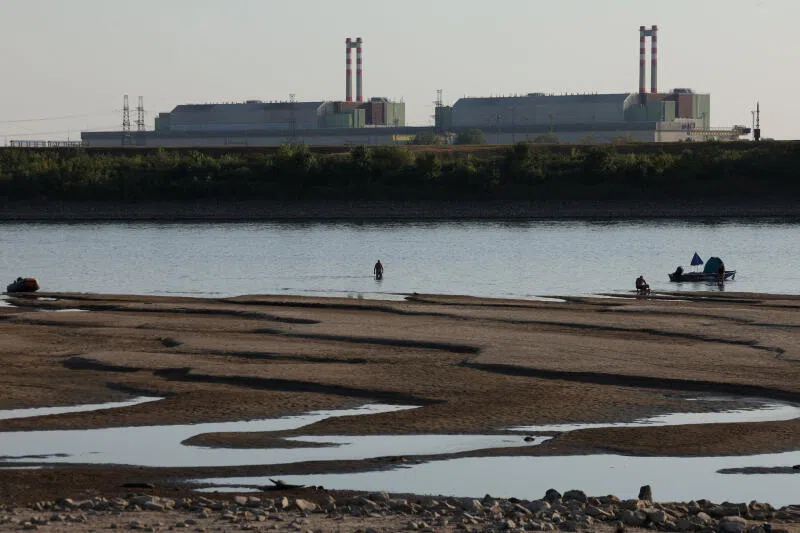 Paks Nuclear Power Plant with the partially dried-up Danube riverbed in Dunaszentbenedek, Hungary.