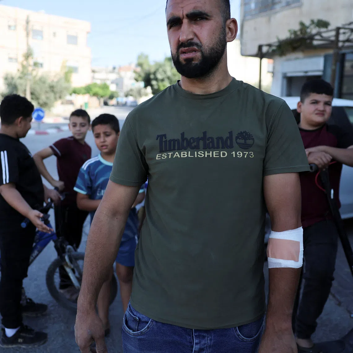 Luay Bayrudi, the owner of a house that came under settler attack, outside of the medical center in Qusra, in the Israeli-occupied West Bank, August 29, 2026. REUTERS/Ammar Awad