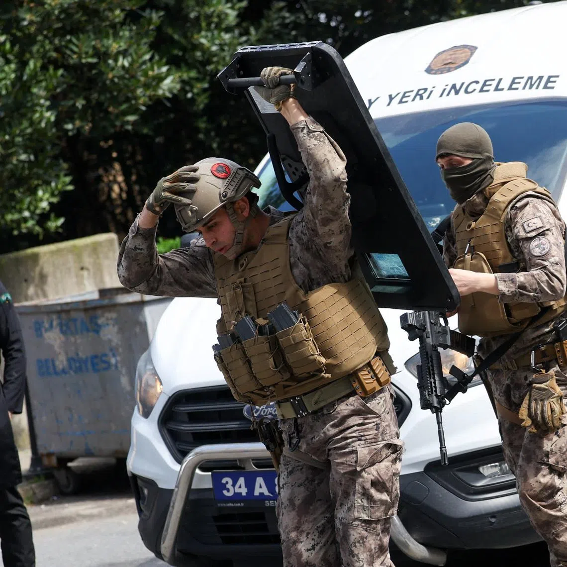 Turkish Police's special forces work at the scene, after gunfire was heard near the building housing the Israeli consulate, according to a witness, in Istanbul, Turkey, April 7, 2026. REUTERS/Murad Sezer