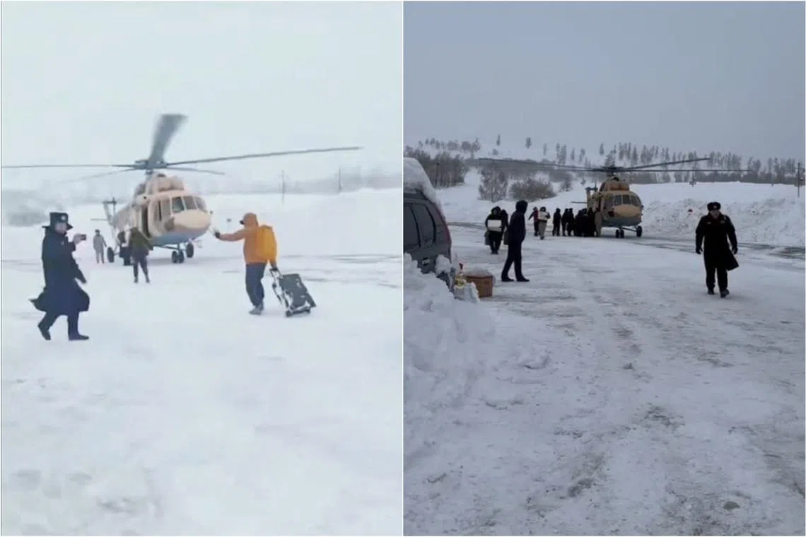 Tourists stranded as a result of avalanches hitting highways are airlifted to safety by helicopter in  Xinjiang.  