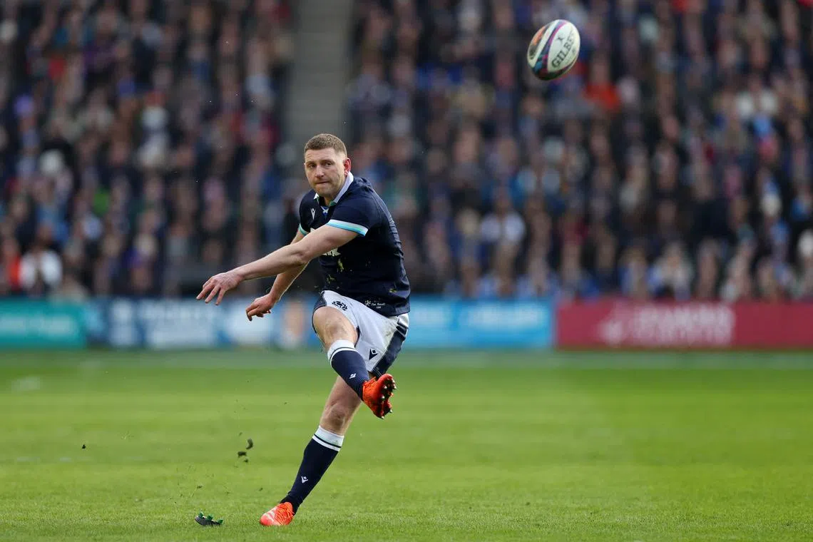 FILE PHOTO: Rugby Union - Six Nations Championship - Scotland v Italy - Murrayfield Stadium, Edinburgh, Scotland, Britain - February 1, 2025 Scotland's Finn Russell kicks a conversion REUTERS/Russell Cheyne/File Photo