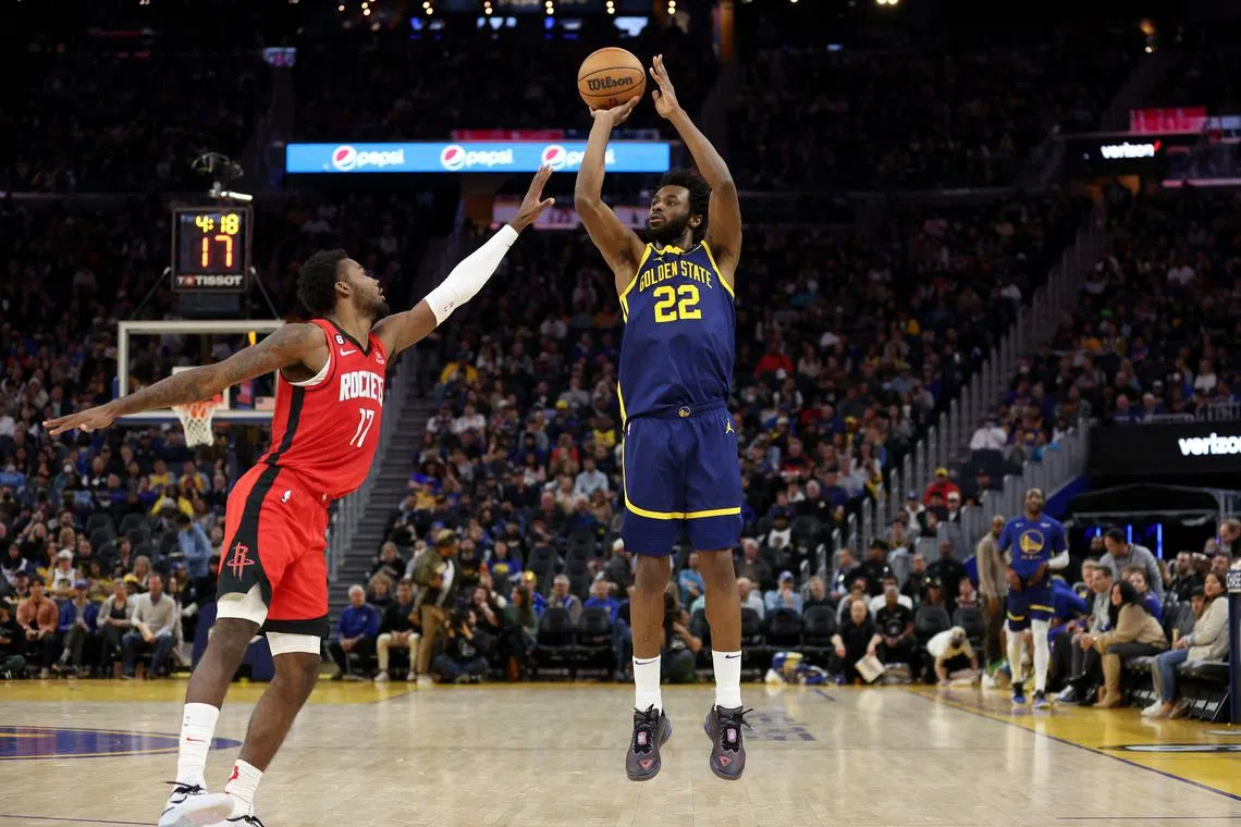 Andrew Wiggins (right) drained a career-high eight three-pointers, five of them in the third quarter when he scored 17 points.