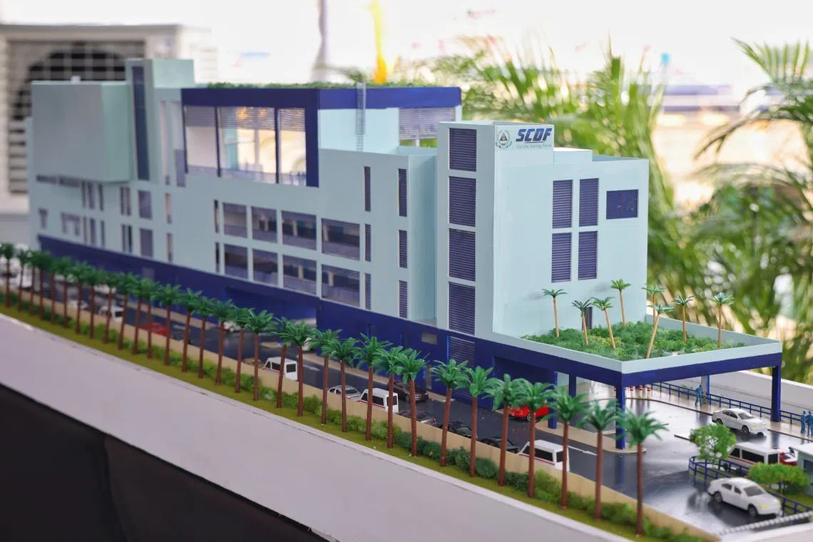 ST20241115_202445000566/ctscdf15/Caelyn Tan/Jason Quah

A model of SCDF?s new Marine Division headquarters pictured at the groundbreaking ceremony on Pulau Brani on Nov 15, 2024. ST PHOTO: JASON QUAH