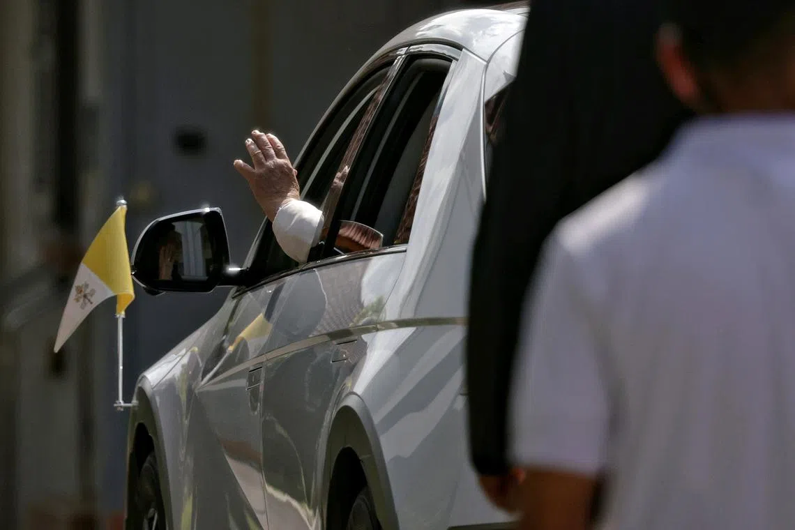 Pope Francis waving as he departs St Theresa's Home on Sept 13, 2024. ST PHOTO: KEVIN LIM pixpope13