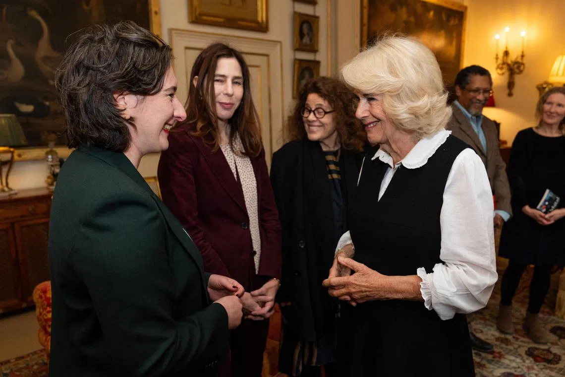 Queen Camilla (right) talking to author Yael van der Wouden, during a reception for the Booker Prize Foundation, in London, on Nov 12. 