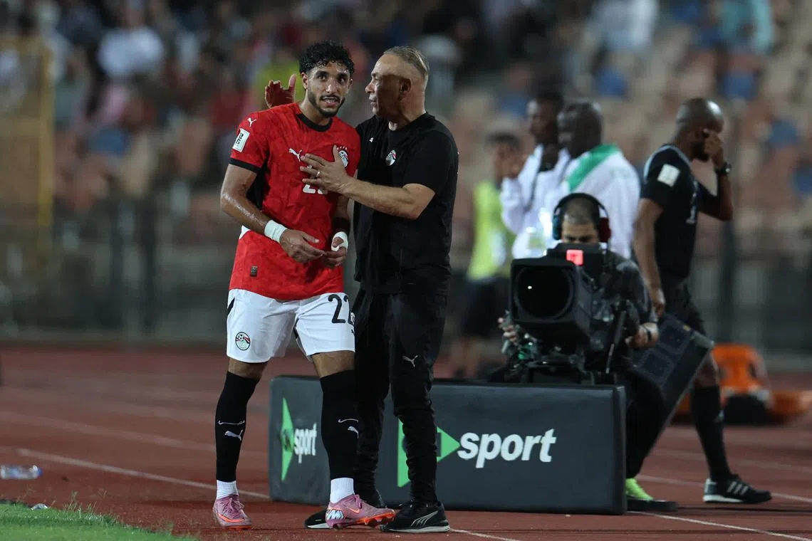 Soccer Football - World Cup - CAF Qualifiers - Group A - Egypt v Ethiopia - Cairo International Stadium, Cairo, Egypt - September 5, 2025  Egypt's Omar Marmoush with Egypt coach Hossam Hassan after being substituted REUTERS/Amr Abdallah Dalsh