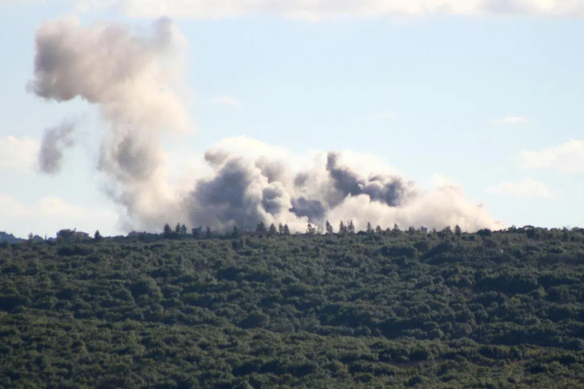 Smoke billows from an area targeted by an Israeli airstrike near Jibbain in southern Lebanon, on Sept 18.