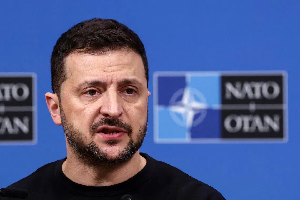 FILE PHOTO: Ukraine's President Volodymyr Zelenskiy attends a press conference, at the NATO headquarters in Brussels, Belgium October 17, 2024. REUTERS/Yves Herman/File Photo