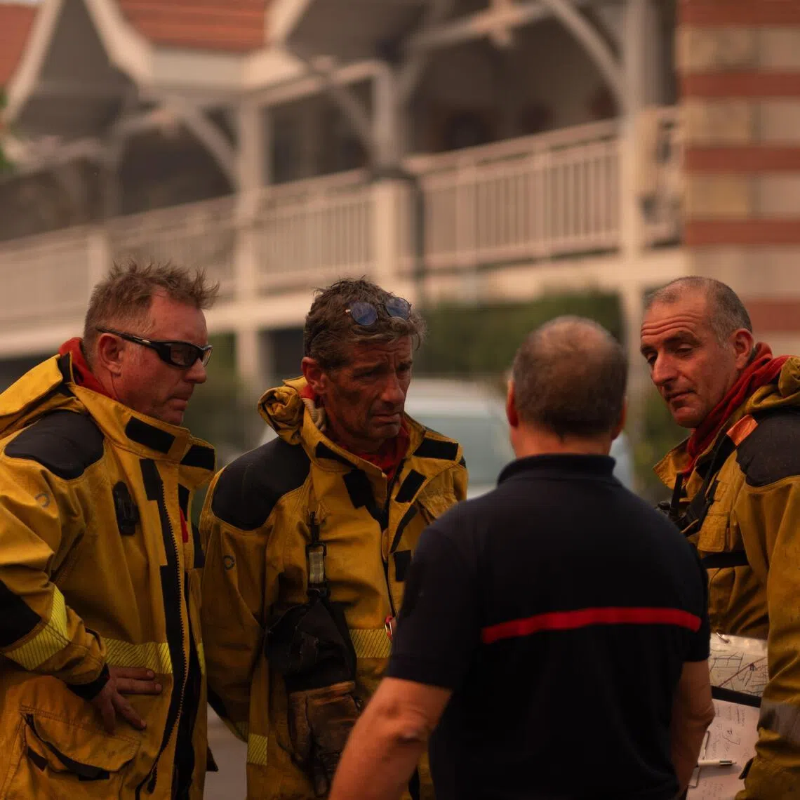 French firefighters helping with the evacuation of tourists and residents from the villages of France’s Cap-Ferret peninsula, in south-western France, on July 24.