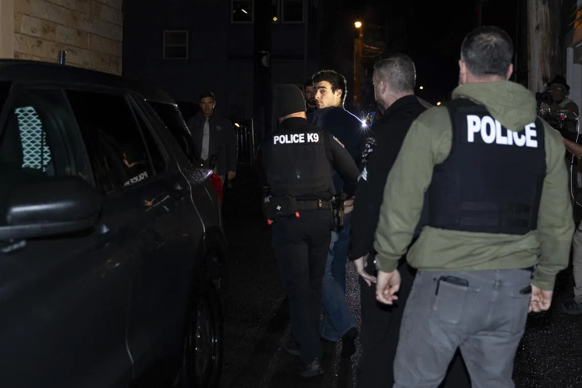The suspect, identified as Luigi Mangione, arrives for his arraignment at the courthouse in Altoona, Pennsylvania, on Dec 9.