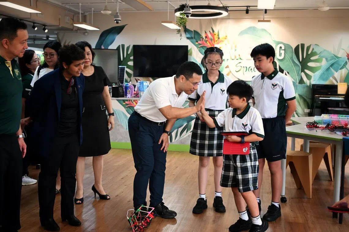 Minister for Education, Mr Desmond Lee, engaging with students as they take part in activities which encourage innovation and problem-solving at the Tinkering Space, at Teck Ghee Primary School, on April 15, 2026. 

With Minister Lee is Ms Rezia Rahumathullah, Principal of Teck Ghee Primary School (left).