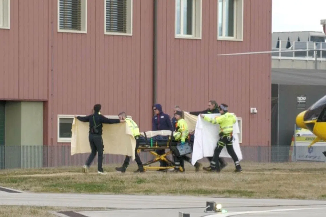Milano Cortina 2026 Olympics - Alpine Skiing - Women's Downhill - Cortina d'Ampezzo, Italy - February 08, 2026. In this screen grab taken from a video shows medical staff moving a stretcher carrying Lindsey Vonn of United States from a helicopter to a hospital in Treviso after she crashed during the Women's Downhill. Antenna 3/via REUTERS