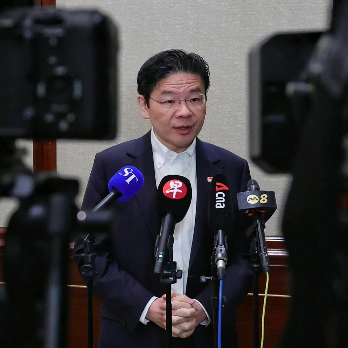 Prime Minister Lawrence Wong speaking to the media during a media wrap-up at Island Shangri-la Hotel, Hong Kong, on March 28, 2026. 