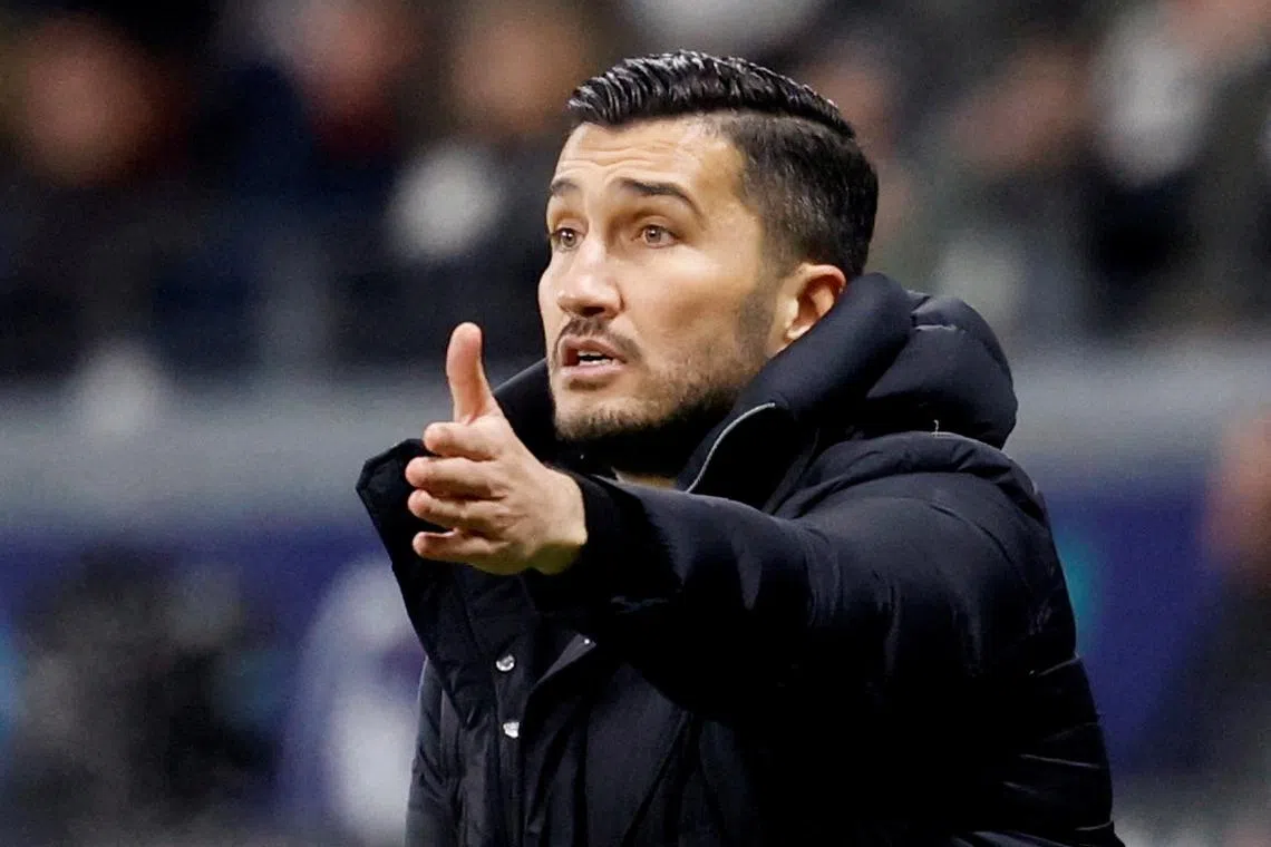 FILE PHOTO: Soccer Football - Bundesliga - Eintracht Frankfurt v Borussia Dortmund - Deutsche Bank Park, Frankfurt, Germany - January 17, 2025  Borussia Dortmund coach Nuri Sahin reacts REUTERS/Heiko Becker/ File Photo