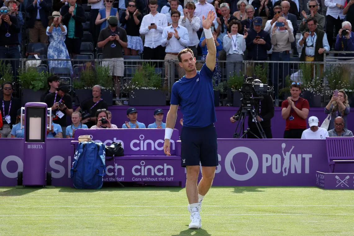 Britain’s Andy Murray waves to the fans after retiring injured during his third round match against Jordan Thompson of Australia.