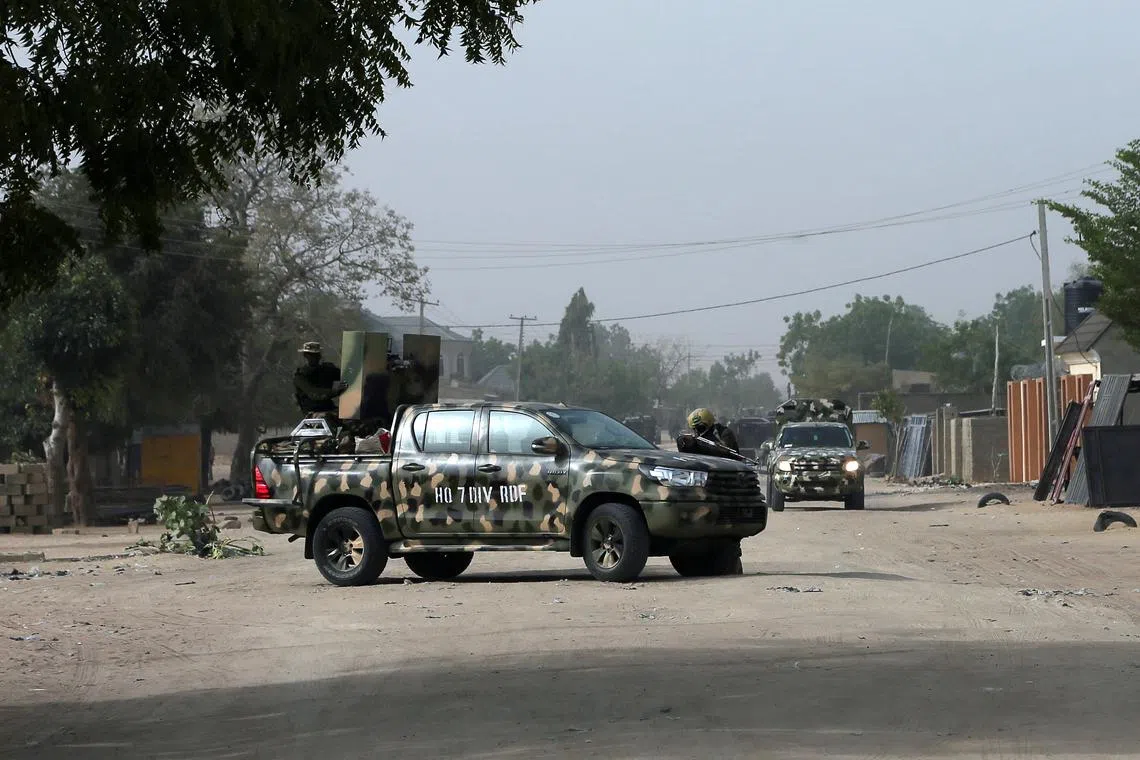 FILE PHOTO: Nigerian military secure the area where a man was killed by suspected militants during an attack around Polo area of Maiduguri, Nigeria February 16, 2019. REUTERS/Afolabi Sotunde/File Photo
