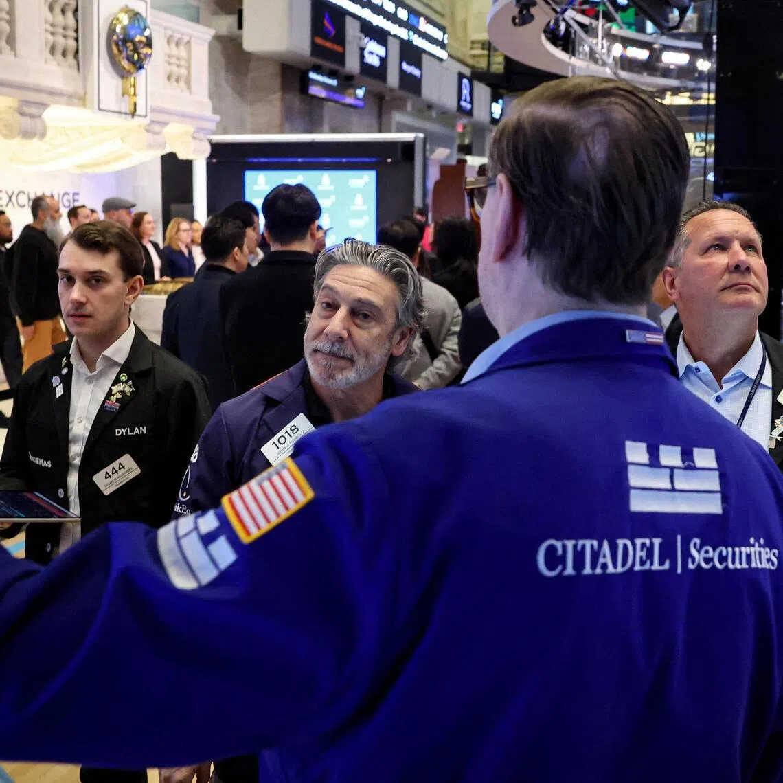 Traders working on the floor of the New York Stock Exchange, in New York City, on Feb 25.