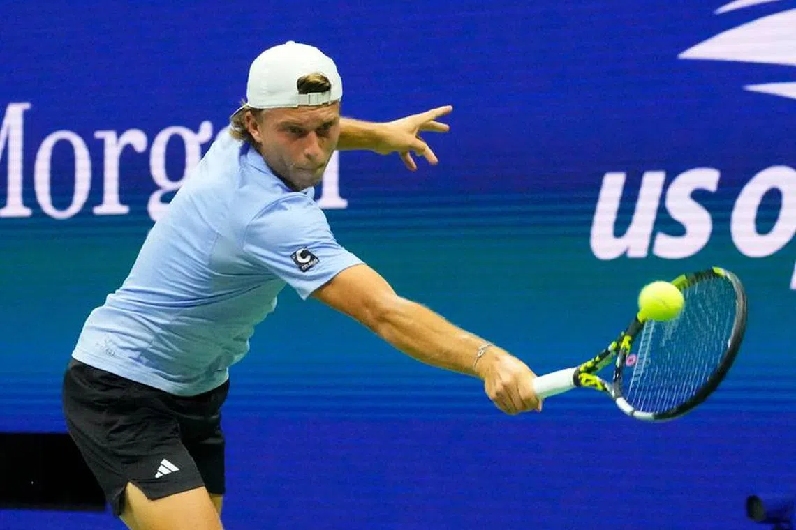 Aug 28, 2023; Flushing, NY, USA;  Alexandre Muller of France hits to Novak Djokovic of Serbia on day one of the 2023 U.S. Open tennis tournament at USTA Billie Jean King National Tennis Center. Mandatory Credit: Robert Deutsch-USA TODAY Sports/ File Photo
