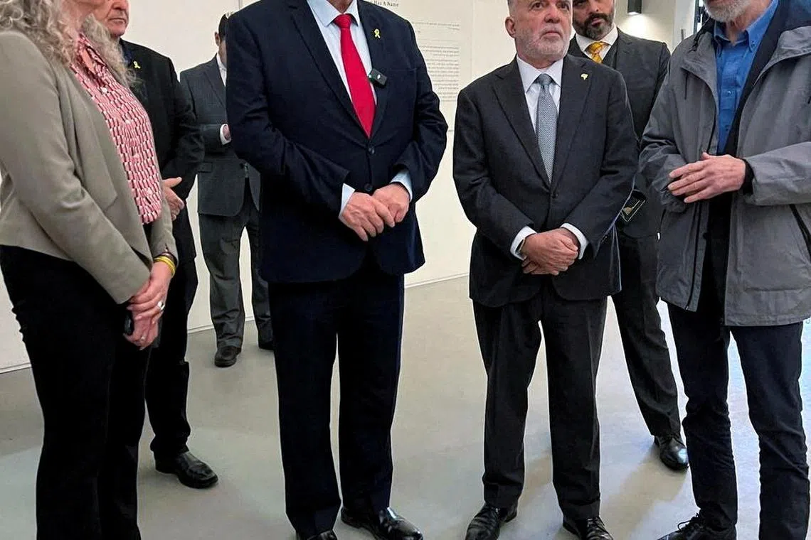 FILE PHOTO: Israeli Foreign Minister Israel Katz stands next to the former Brazilian ambassador to Israel, Frederico Meyer, after Brazilian President Luiz Inacio Lula da Silva likens the Gaza war to the Holocaust, in Yad Vashem, at the World Holocaust Remembrance Centre, in Jerusalem, February 19, 2024. REUTERS/Dedi Hayun/File Photo