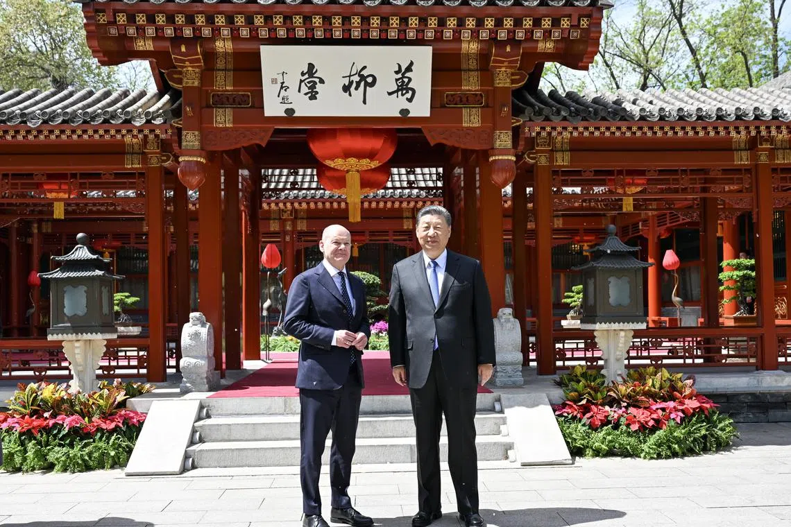 Mr Scholz's talks with Mr Xi (right) capped a three-day tour of China, during which Mr Scholz walked an economic tightrope.