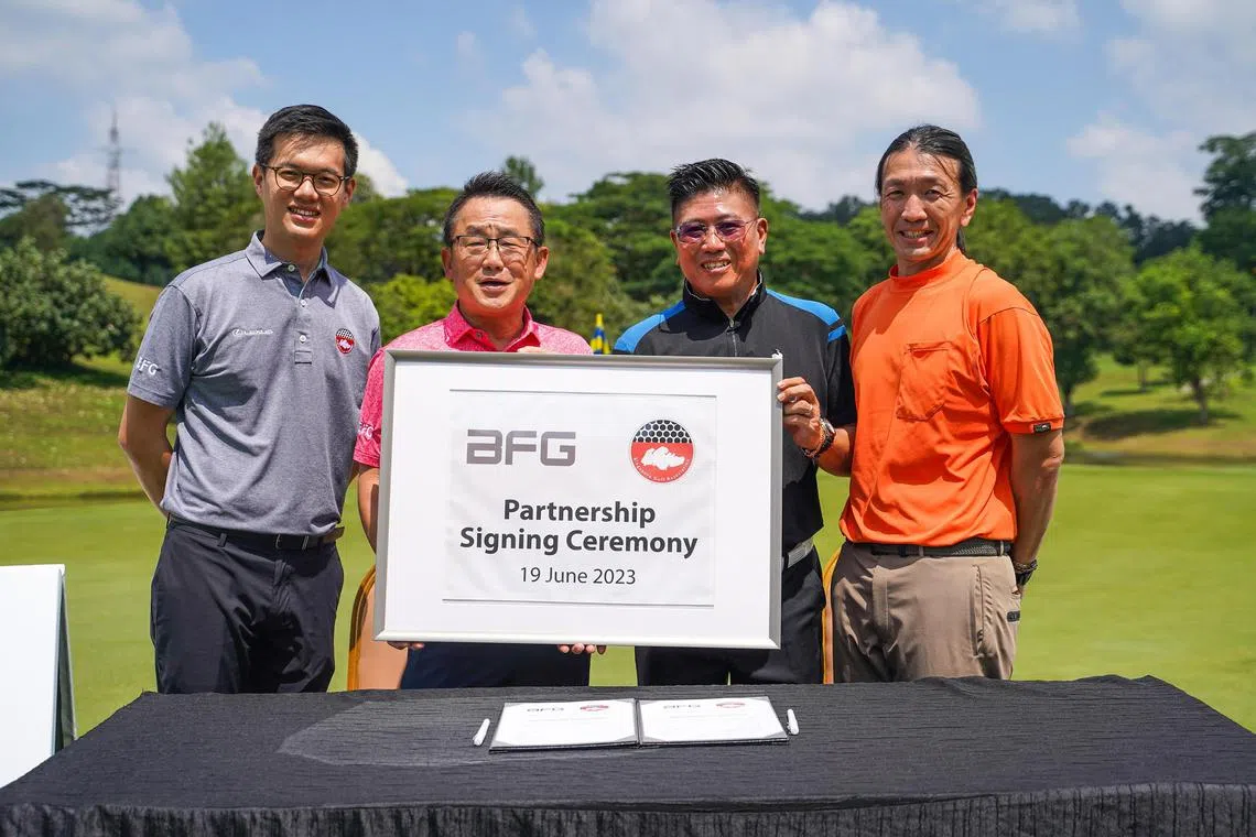 kygolf20 - (L-R) Mr Joshua Ho, General Manager of Singapore Golf Association, Mr Tan Chong Huat, President of Singapore Golf Association, Mr Lawrence Ng,  Co-founder of BFG Golf and Mr Iskandar Tjokro, Co-founder of BFG Golf posing for a photo after signing their partnership agreement.

