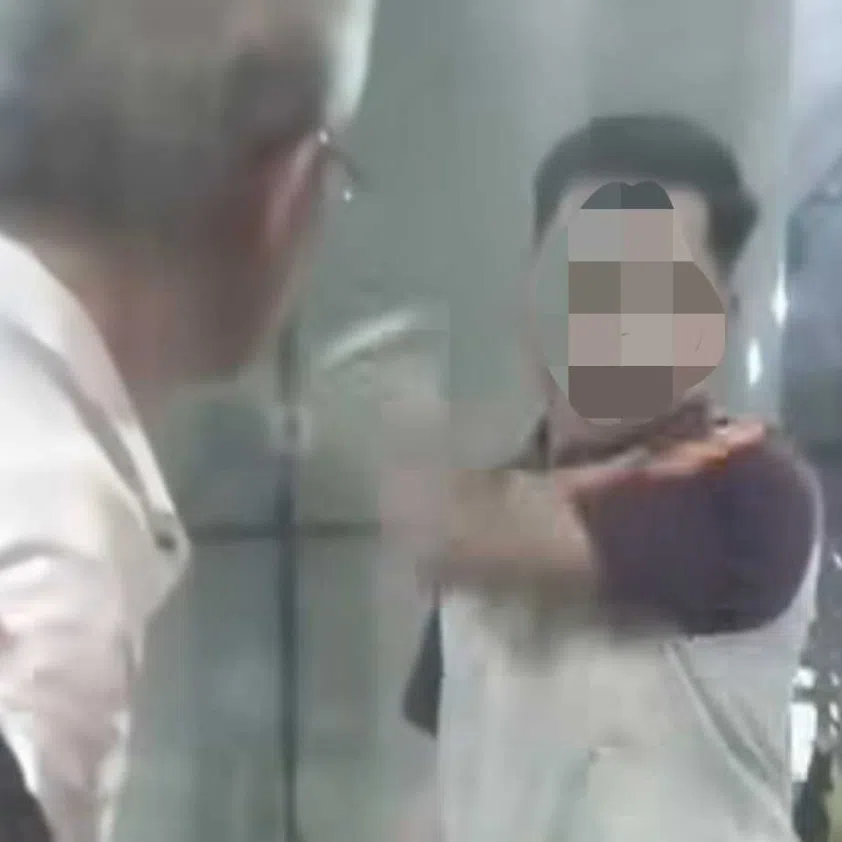 In a video posted on social media, the traffic inspector appears to shout an expletive at the older man as he tells him to go back and queue.