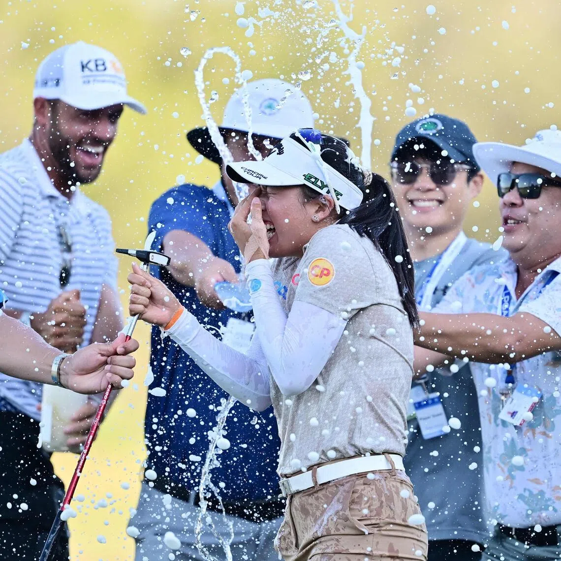 Jeeno Thitikul of Thailand is sprayed with champagne after her winning putt on the 18th green during the final round of the LPGA Tour Championship.