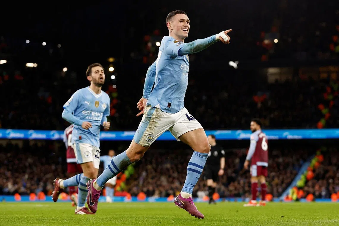 Soccer Football - Premier League - Manchester City v Aston Villa - Etihad Stadium, Manchester, Britain - April 3, 2024 Manchester City's Phil Foden celebrates scoring their third goal Action Images via Reuters/Jason Cairnduff