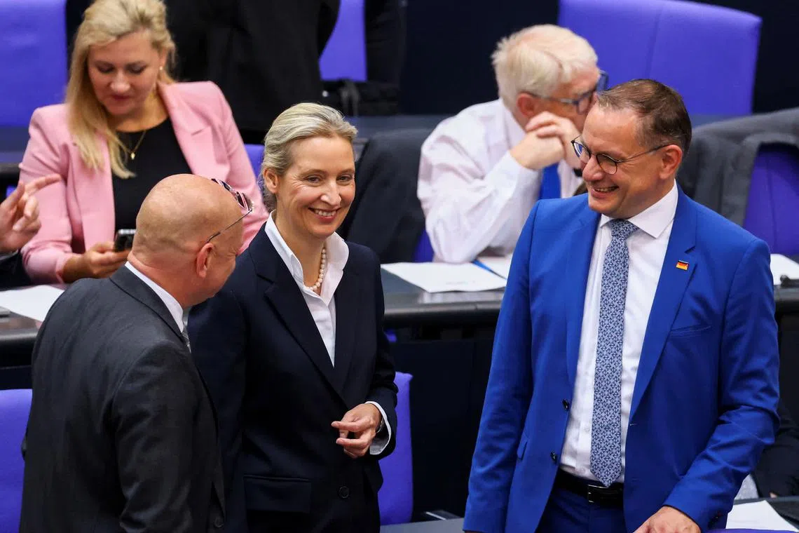 FILE PHOTO: Alice Weidel and Tino Chrupalla, co-leaders of the far-right party Alternative for Germany (AfD), attend a plenum session of the lower house of parliament, the Bundestag, in Berlin, Germany June 5, 2025. REUTERS/Christian Mang/File Photo