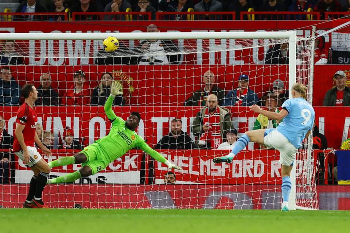 Soccer Football - Premier League - Manchester United v Manchester City - Old Trafford, Manchester, Britain - October 29, 2023  Manchester City's Erling Braut Haaland scores their second goal REUTERS/Molly Darlington