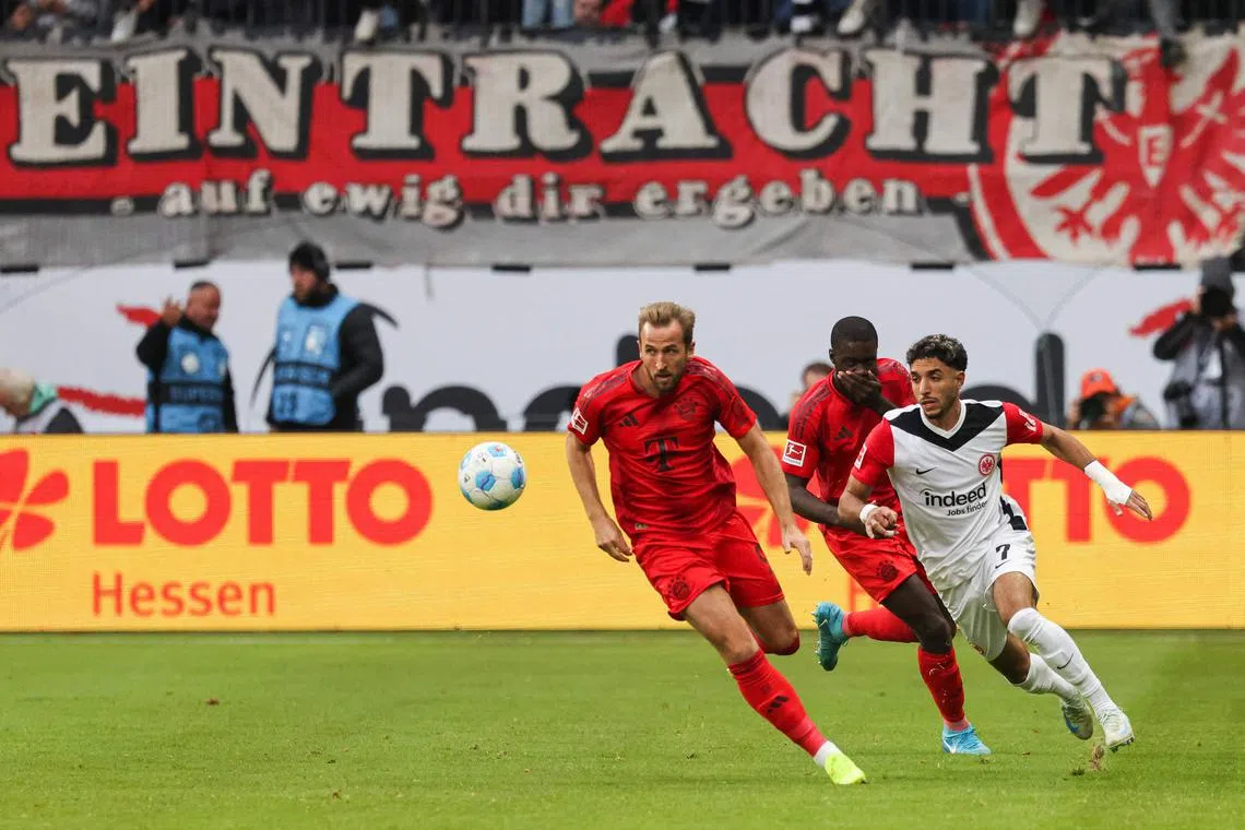 Bayern Munich's English forward Harry Kane (left) and Eintracht Frankfurt's Egyptian forward Omar Marmoush vying for the ball on Oct 6. Kane later clashed with an Eintracht player and collapsed to the ground grimacing in pain, but has since been passed fit to play for England.
