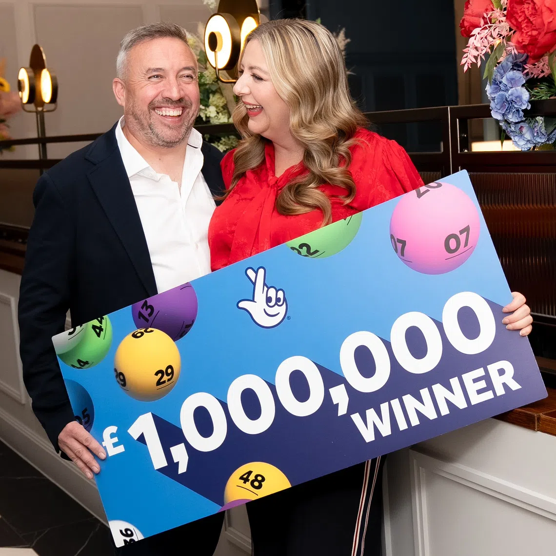Mr Richard Davies and his wife Faye Stevenson-Davies defied the odds of more than 24 trillion to one to win the Lotto draw on Nov 26.