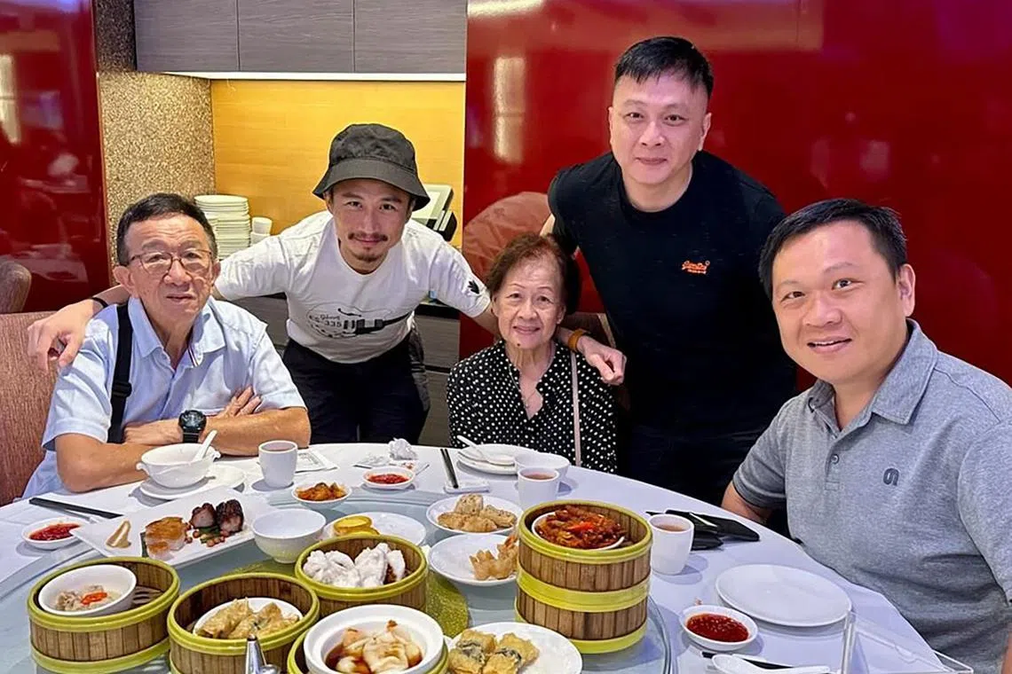 Mr Jimmy Lim (far right), 47, with his family. He has been a caregiver to his elderly parents for the past six years.