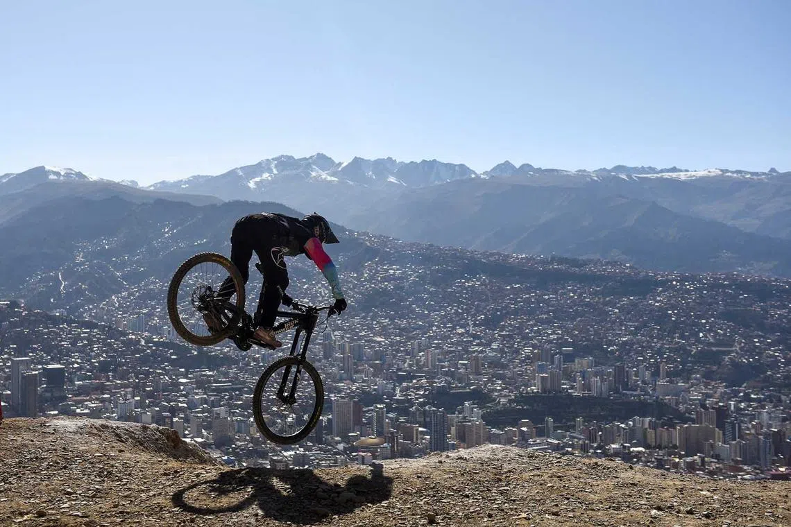 A cyclist descends slopes during the Challenge Downhill mountain biking race, in La Paz, Bolivia, May 21.