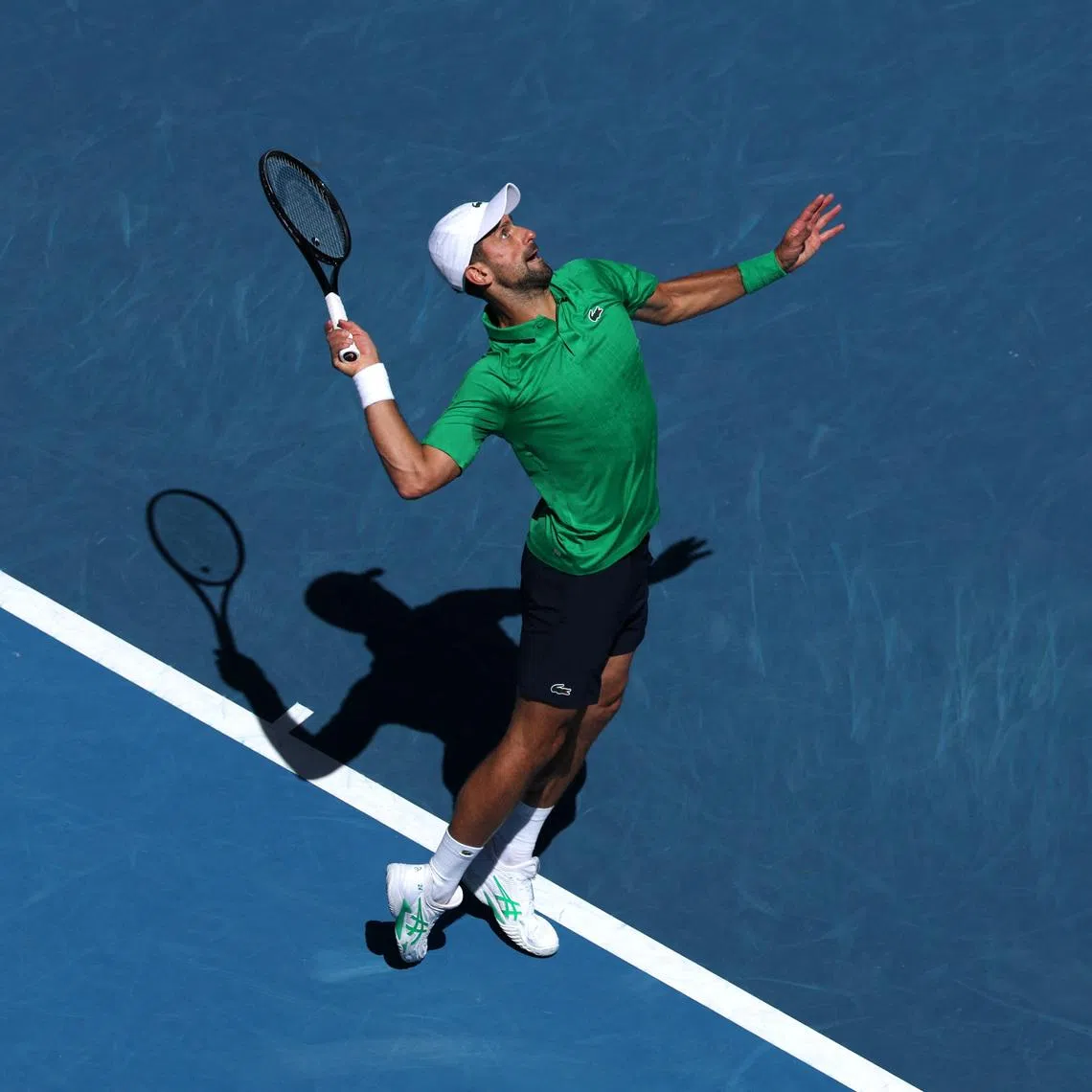 Tennis - Australian Open - Melbourne Park, Melbourne, Australia - January 22, 2026 Serbia's Novak Djokovic in action during his second round match against Italy's Francesco Maestrelli REUTERS/Edgar Su