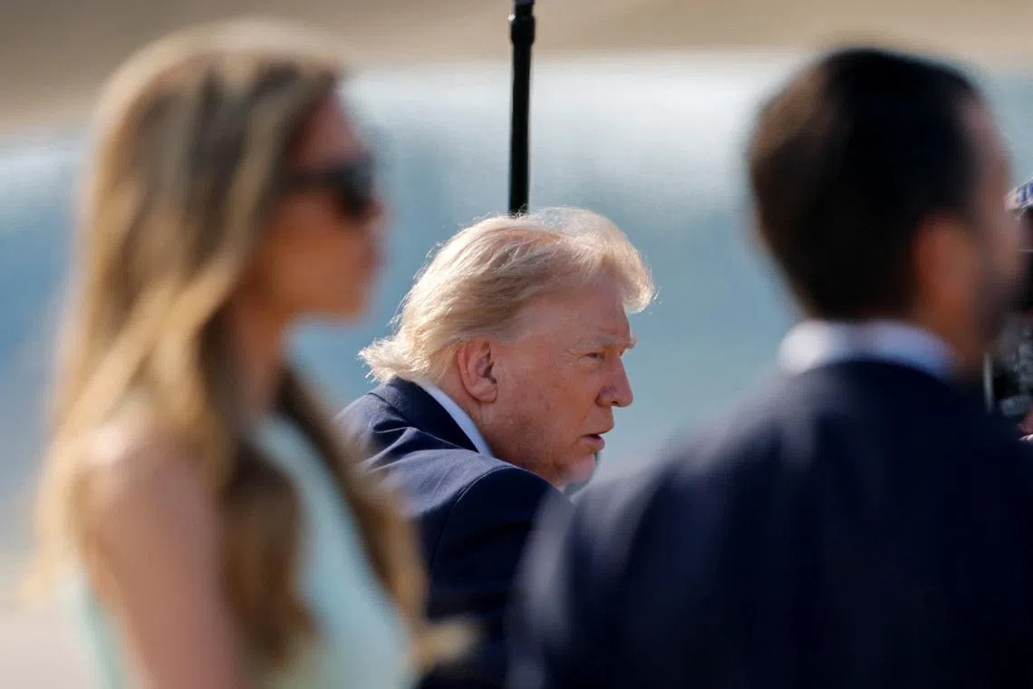 U.S. President Donald Trump speaks with reporters as he arrives to board the new Air Force One, a plane gifted by the Qatari government, after departing Joint Base Andrews, Maryland, U.S., July 1, 2026. REUTERS/Kylie Cooper