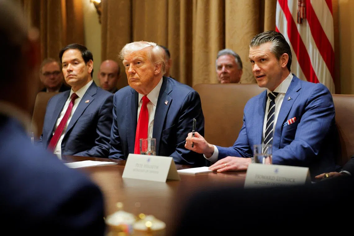 US President Donald Trump hosts his first Cabinet meeting, with Secretary of State Marco Rubio (left) and Defence Secretary Pete Hegseth, on Feb 26.
