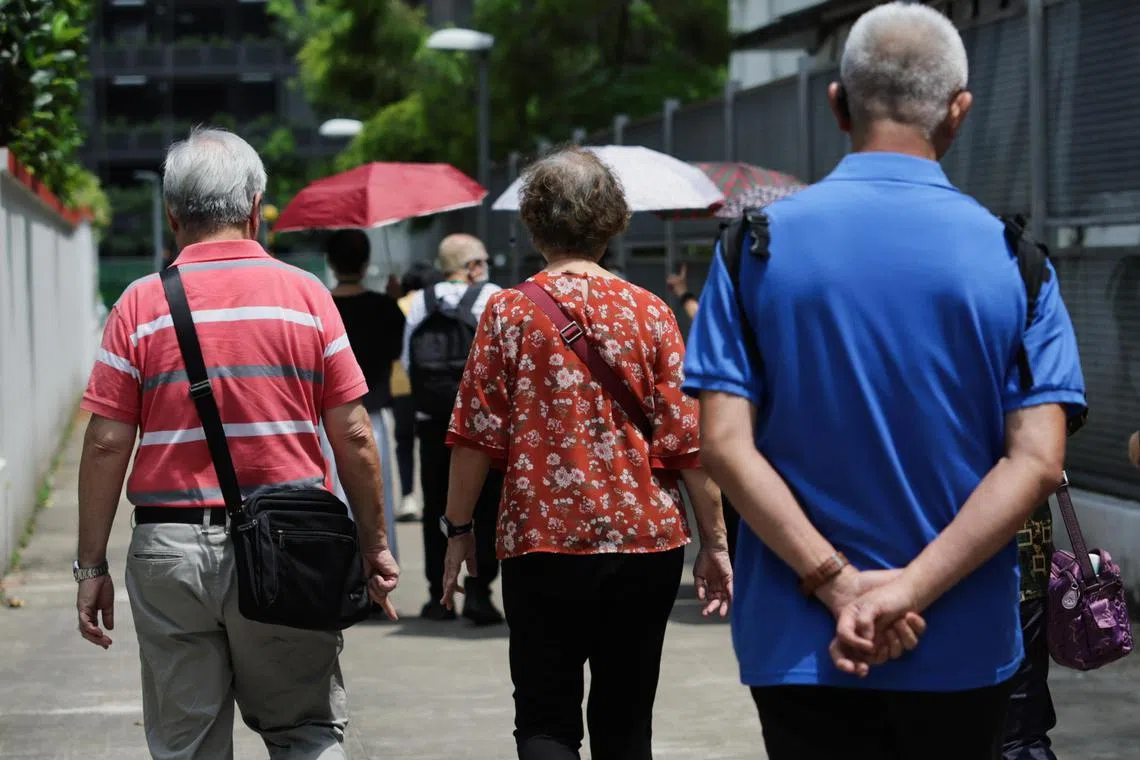 ST20240408_202446663017: Gin Tay/ pixgeneric /

Generic photo of elderly with umbrellas on a hot day in Newton, on April 8, 2024. 

Can use for stories on hot weather, seniors, ageing populations, health,