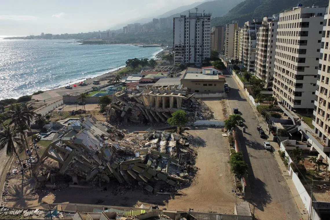 A drone view of the destroyed buildings in the aftermath of the June 24 earthquakes, in Macuto, La Guaira state, Venezuela July 8, 2026. REUTERS/Leonardo Fernandez Viloria