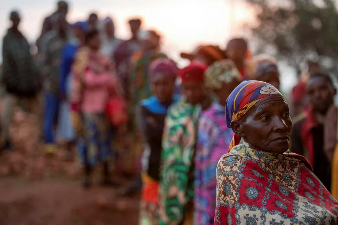 People queueing to vote during the Burundian legislative elections at the Musama Primary School in Musama hill in Giheta Commune of Gitega Province in Burundi, on June 5, 2025. 