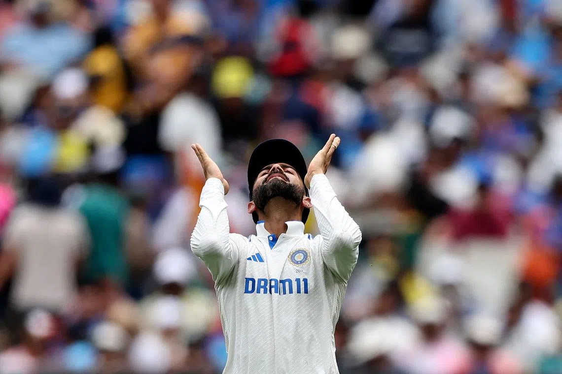 India's Virat Kohli reacts to an appeal on Day 1 of the fourth cricket Test match between Australia and India at the Melbourne Cricket Ground.