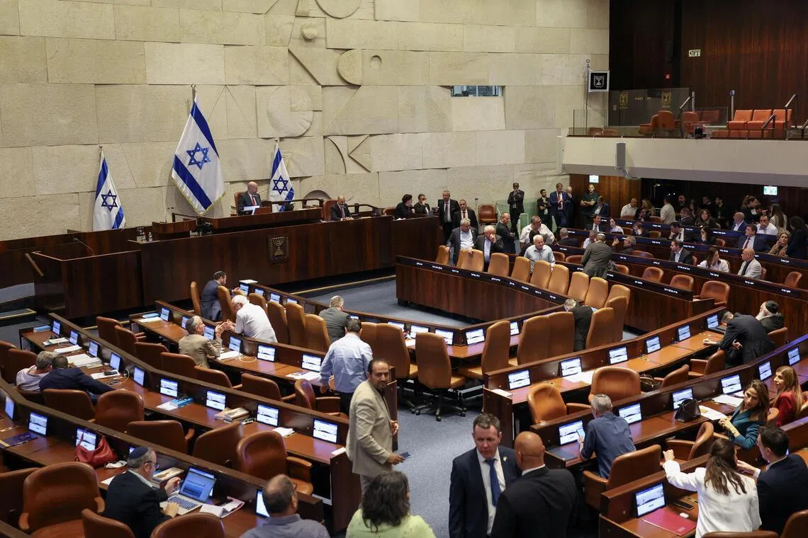 Israel takes step towards snap election as lawmakers vote to dissolve Parliament