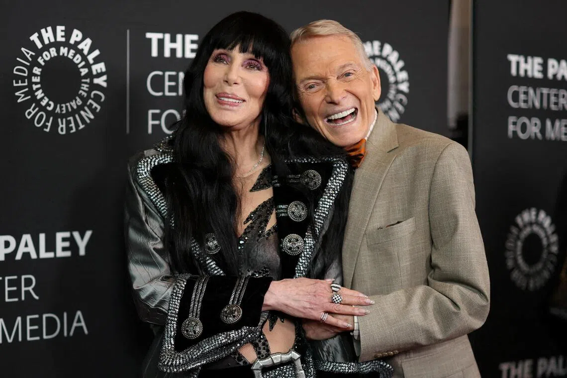 Fashion designer Bob Mackie and singer Cher attend a premiere for the documentary “Bob Mackie: Naked Illusion” in Los Angeles, California, on May 13, 2024.